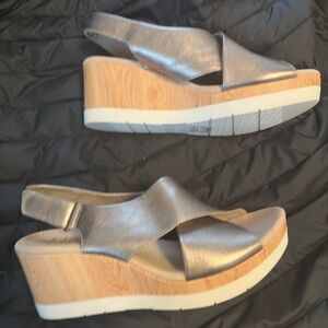 Clarks Metallic LeatherSandals with Crisscross Design